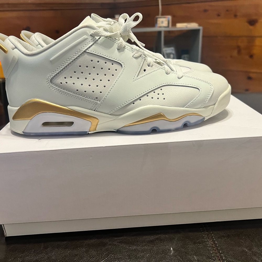 Air Jordan 6 retro low.  With box.  Good condition.  Size 10.5  white/gold